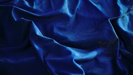 worn blue fabric waving as a background