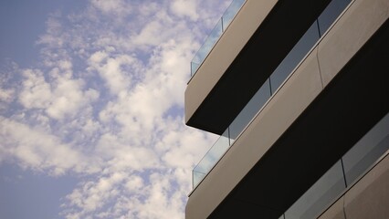 contemporary building facade against cloudy sky