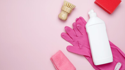 Various accessories cleaning products, sprays, rags, sponges and brushes. Top view, flat lay, copy space