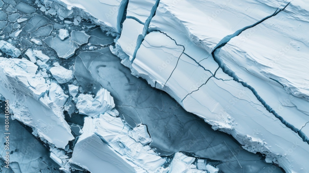 Poster smooth slippery ice sheets broken up by deep crevasses creating a rugged texture..
