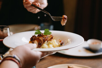 woman eating a octopus