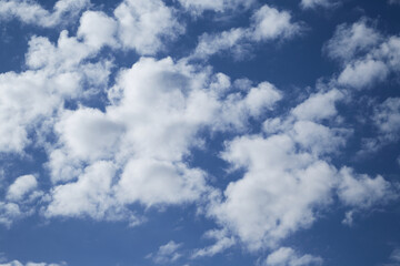 White clouds in the sky, fluffy cloud formations, sky with clouds
