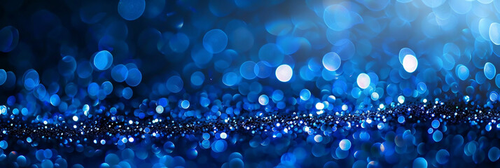 Cobalt Blue Glitter Defocused Abstract Twinkly Lights Background, sparkling blurred lights in deep cobalt blue hues.
