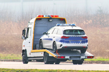 Professional Vehicle Recovery in Action. Tow car truck.