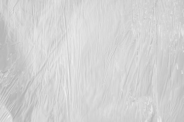 white packaging film with folds and wrinkles, abstract background