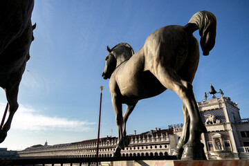 View of the Horses of Saint Mark in St Mark's Square at sunset time; The Procuratie Vecchie and the...