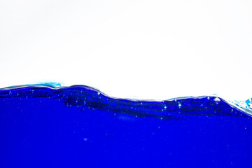 Blue water waves and bubbles