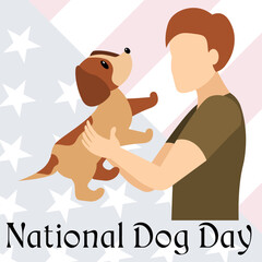 International Dog Day celebration. A man holds a cute puppy in his hands against the background of the American flag.