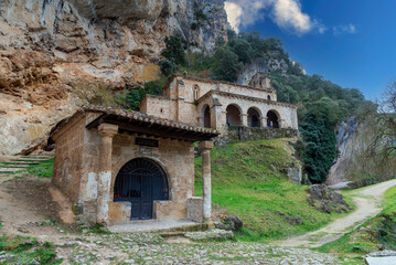 Hermitage of Santa María de la Hoz built on a hill, in stone and in front of a small medieval building in the small village of La Tobera, belonging to the municipality of Frías.