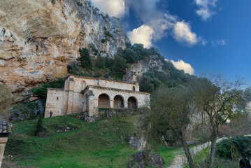 Hermitage of Santa María de la Hoz built in stone on a hill in the small village of La Tobera, belonging to the municipality of Frías.