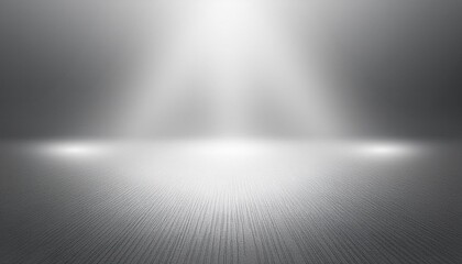spotlit grey floor in white and gray studio backdrop