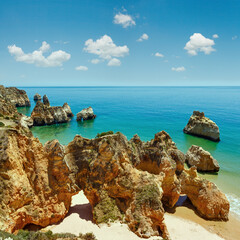 Top view on sandy beach Dos Tres Irmaos(Portimao, Alvor, Algarve, Portugal).