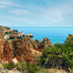 Summer Atlantic rocky coastline top view (Portimao, Alvor, Algarve, Portugal).