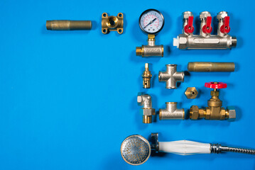 Plumbing water line equipment on the blue flat lay background. Plumbing service background with copy space.