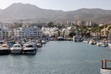  Boats and yachts moored at Puerto Marina in Benalmadena, Costa del Sol Malaga, Spain. This marina has berths for 1100 boat