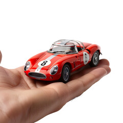 Model car in hand isolated on a transparent background 
