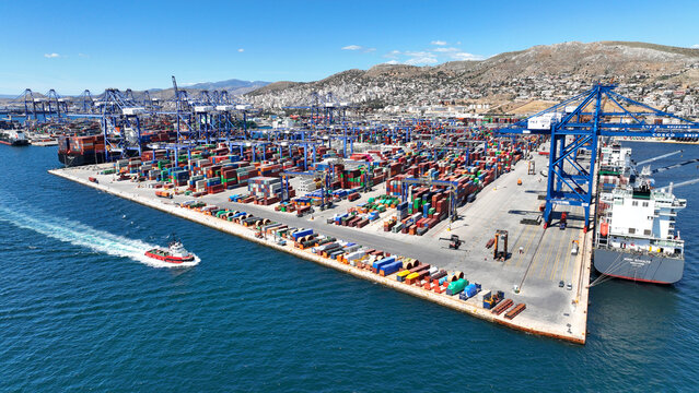 Aerial drone photo of industrial container logistics unloading import and export container terminal of Perama - Piraeus