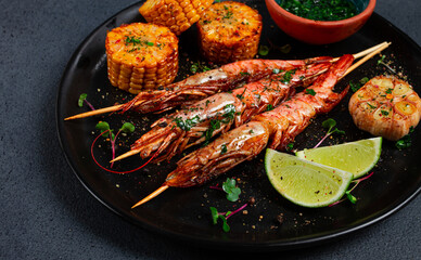 langoustines on skewers, shrimp kebab, with fried corn, spices and herbs, homemade, no people,