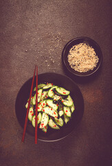 Chinese salad, cucumbers with chili pepper and sesame seeds, homemade, no people,