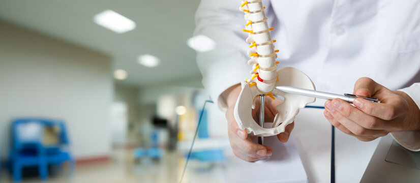 Doctor shows problem area on hip joint.