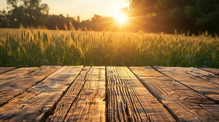 rustic wooden table with prosperous farm landscape at sunset agriculture concept