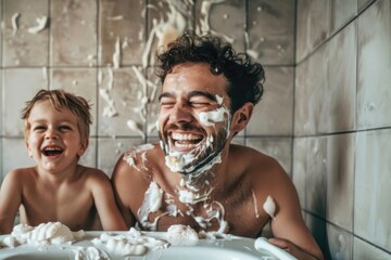 Father and son having fun while shaving in bathroom