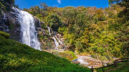 Obraz premium Wachiratarn waterfall in deep forest on Doi Inthanon national park, Chiang Mai, Thailand