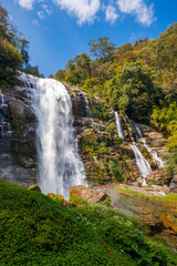 Obraz premium Wachiratarn waterfall in deep forest on Doi Inthanon national park, Chiang Mai, Thailand
