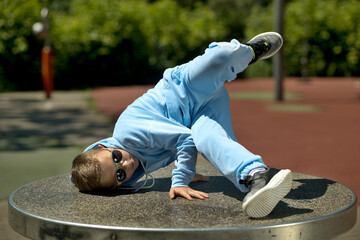 Little boy in breakdancing position. Breakdance boy, breakdance kid