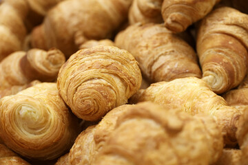 Fresh baked croissants. Tasty breakfast, sweet cakes