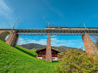 Train crossing over the Gstaad Viaduct