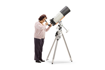 Full length shot of an elderly woman observing through a telescope