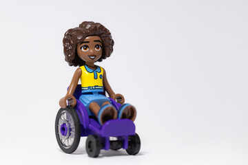 Fototapeta premium Lego Friends disabled girl on wheelchair