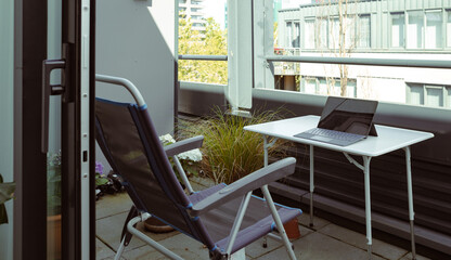 working desk and chair on the balcony, working from home concept