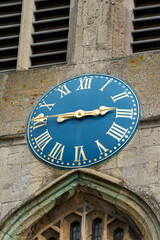 Blue Clock Face on St Nicholas Church in Newbury Berkshire
