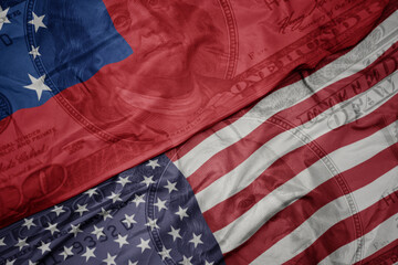 Obraz premium waving colorful flag of united states of america and national flag of Samoa on the dollar money background. finance concept.