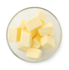 Tasty butter cubes in bowl isolated on white, top view