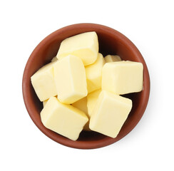 Tasty butter cubes in bowl isolated on white, top view