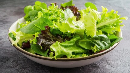 Top view healthy food of fresh green salad with spinach, lettuce and vegetables in bowl. AI generate