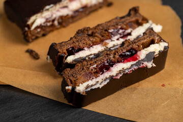 cottage cheese dessert with cherry jam covered with chocolate