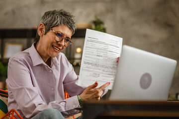 Mature woman share document and have consultation via video call