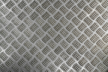the texture of a perforated metal sheet