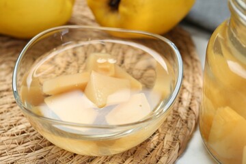 Delicious quince drink and fresh fruits on table, closeup