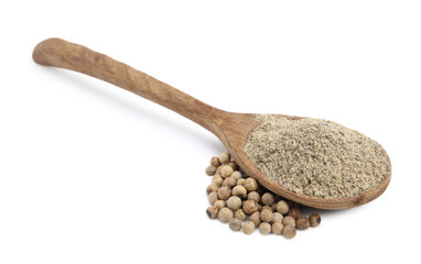 Aromatic spice. Ground pepper in spoon and peppercorns isolated on white