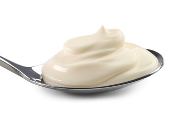 Natural yogurt in spoon isolated on white