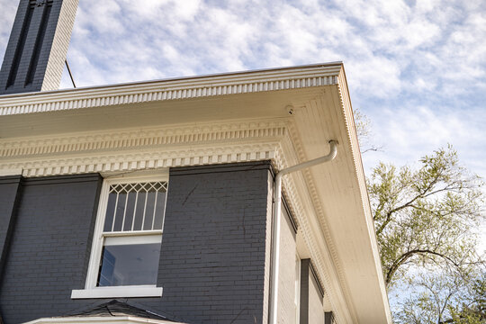 Cute Blue Brick Home White Trim Roof