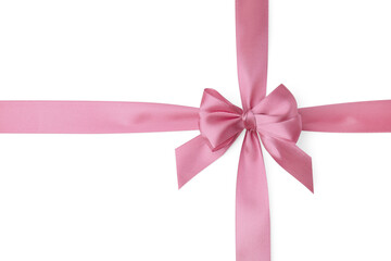 Pink satin ribbon with bow on white background, top view