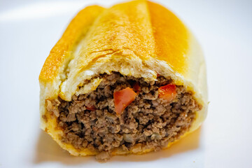 Traditional French bread sandwich with minced meat known as 