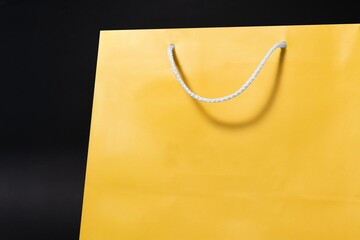 Yellow paper shopping bag, simple design space