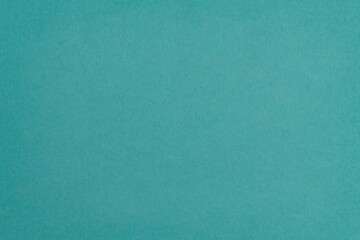 Teal paper texture background, copy space